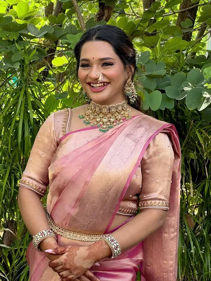 The happiest clients are the most beautiful. Isha's genuine smile is the perfect accessory to her elegant engagement makeup.