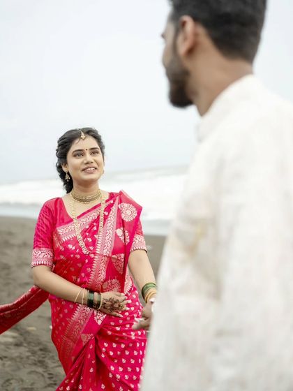 A look of love and trust. This over-the-shoulder shot creates a sense of intimacy and connection in this pre-wedding photo.