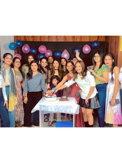 The whole family together! A big group photo of our students and trainers celebrating a special day at the academy.