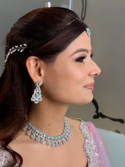 Another angle of the engagement look, this time showing the other side with a different hair accessory. This demonstrates how I can create a balanced yet unique look from all sides.