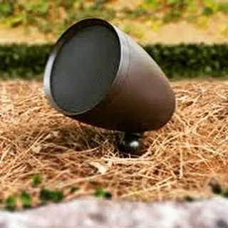 A product shot of a durable, all-weather outdoor satellite speaker. These units are designed to withstand the elements while delivering rich, full-range audio to your outdoor living spaces.