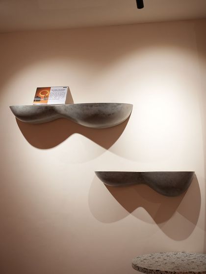 These concrete wall shelves have a soft, cloud-like form. They are perfect for displaying small items or can stand alone as sculptural wall art, adding a touch of gentle, organic design to your interior.