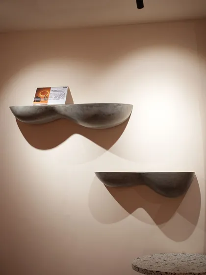 These concrete wall shelves have a soft, cloud-like form. They are perfect for displaying small items or can stand alone as sculptural wall art, adding a touch of gentle, organic design to your interior.