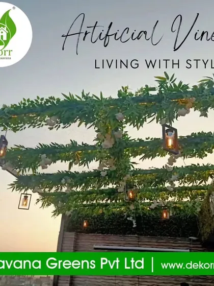 Living with style. This rooftop pergola is decorated with artificial vines and hanging lanterns, creating a magical and stylish outdoor lounge area.