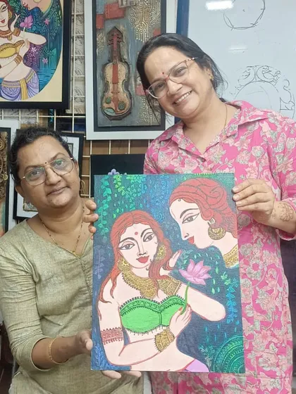 The joy on a student's face as she holds her completed canvas painting is why we do what we do. Our adult art batches provide a relaxing space to unwind and create.