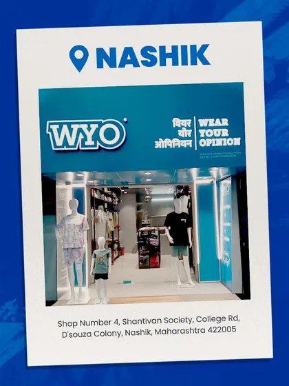 Announcing my new store in Nashik, with the address and a photo of the storefront.