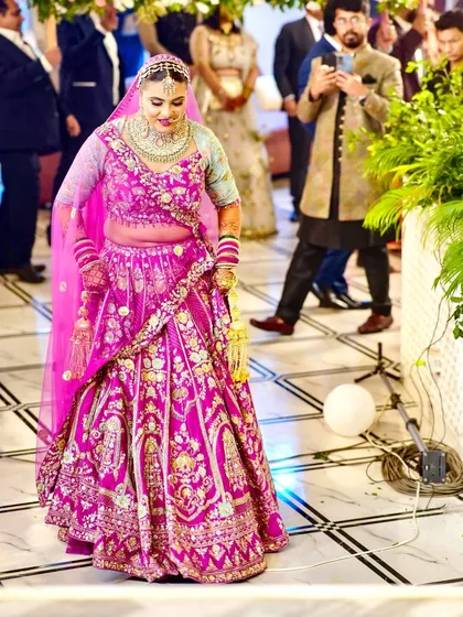 The bride's solo entry, captured in a candid moment.