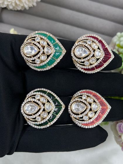 My leaf-shaped moissanite rings, available in green and red meenakari.