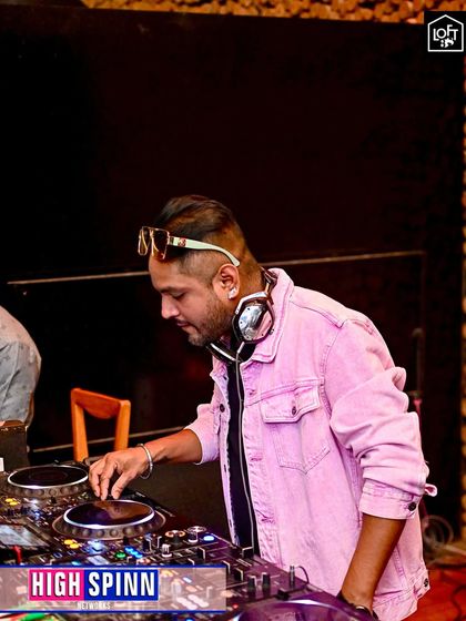 A candid shot of me at the decks during a memorable Sunday night at Loft38. The pink denim jacket added a pop of color to the Bollywood Mantra event.
