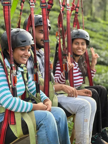 A group of friends getting ready for ziplining in Wayanad.