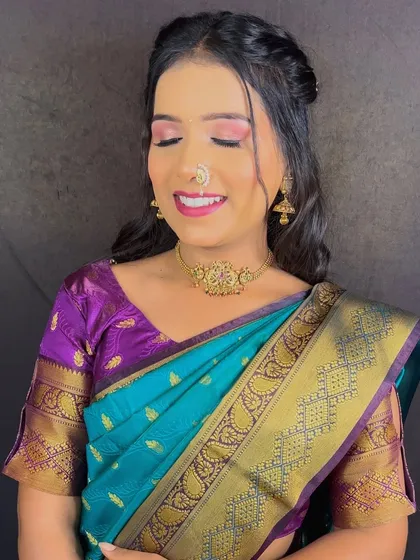 A beautiful engagement look with a focus on pink and purple tones. The eyeshadow is soft and shimmery, and the lip color is a beautiful matching shade.