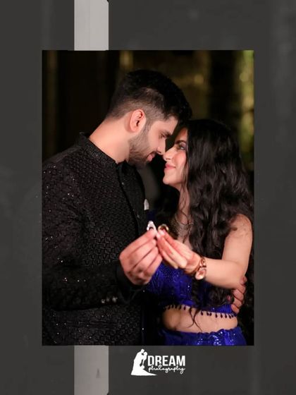 A close-up of the couple holding their engagement rings, a simple yet powerful image symbolizing their commitment.