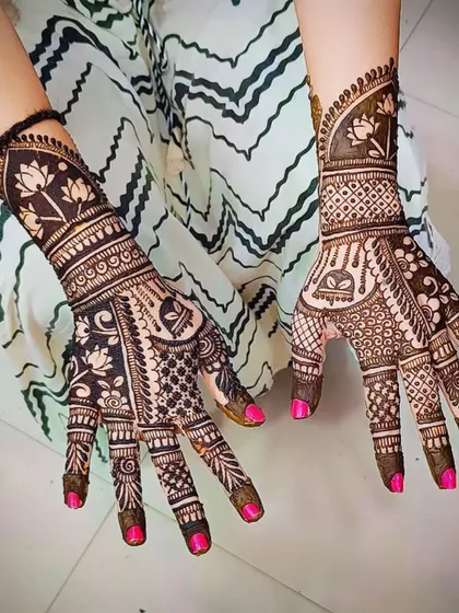 A striking back-of-hand design featuring bold lotus motifs and geometric patterns, creating a modern and edgy look.