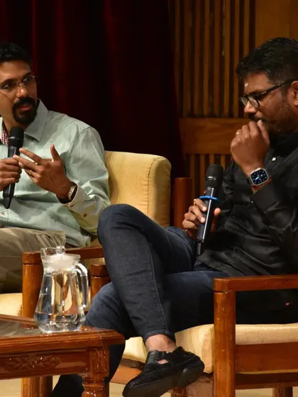 Listening intently to a question from the moderator at IIM Bangalore. A good discussion requires as much listening as it does speaking.