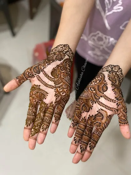 A beautiful Indo-Arabic design with a mix of floral and paisley motifs. The patterns are intricate and flow beautifully.