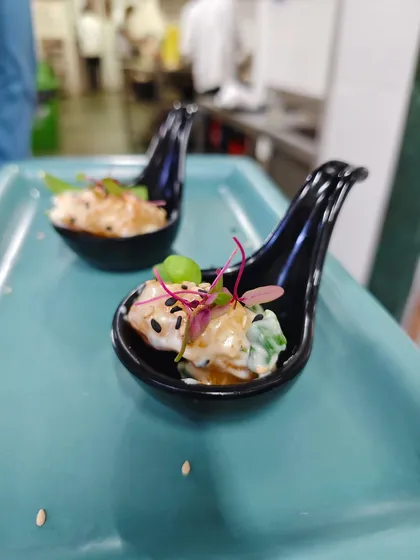 Gourmet moments, one spoon at a time. We use elegant serveware to present our appetizers, ensuring the visual experience matches the exquisite taste.
