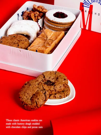 A different view of the Chocolate Chip Pecan Cookies, showcasing their chewy texture.