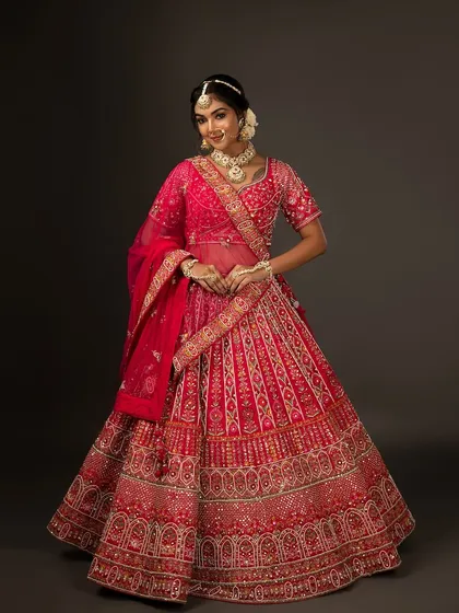 A final full-length shot, showcasing the grandeur of the entire bridal ensemble.