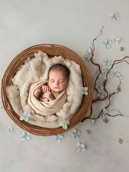This final image is a composite, where the baby was photographed separately from the styled nest. In the workshop, you will learn this essential technique for creating elaborate and artistic newborn portraits safely.