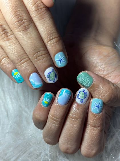 A full vacation-themed set with hand-painted turtles, starfish, shells, and ocean waves. So much fun to create.