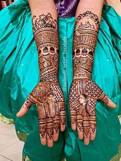 Intricate bridal mehendi covering the hands and forearms. This design features a mix of geometric patterns, floral work, and a beautiful peacock motif.