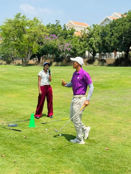 Our coaches are constantly on the range, providing hands-on instruction. From demonstrating a swing path to analyzing a student's setup, these moments of direct mentorship are where real progress is made.