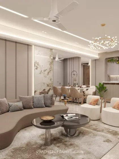 This living space exudes modern luxury with its harmonious blend of organic curves, rich textures, and sculptural furniture. The open kitchen concept seamlessly integrates with the living and dining areas, fostering a sense of connectivity and spaciousness.