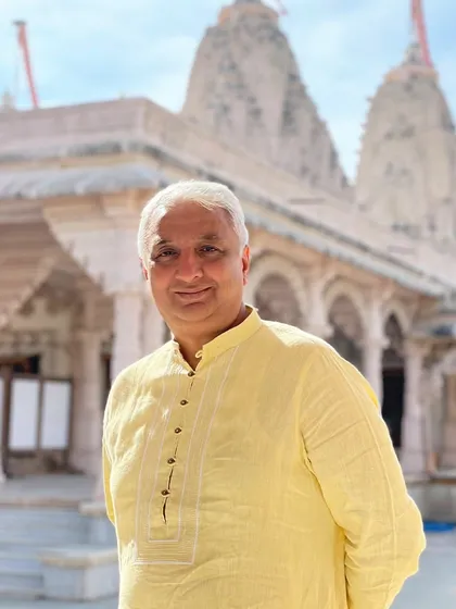 A client looking comfortable and stylish in a yellow kurta made from natural hemp fabric. It's a perfect example of how you can choose eco-friendly clothing without compromising on look or feel.