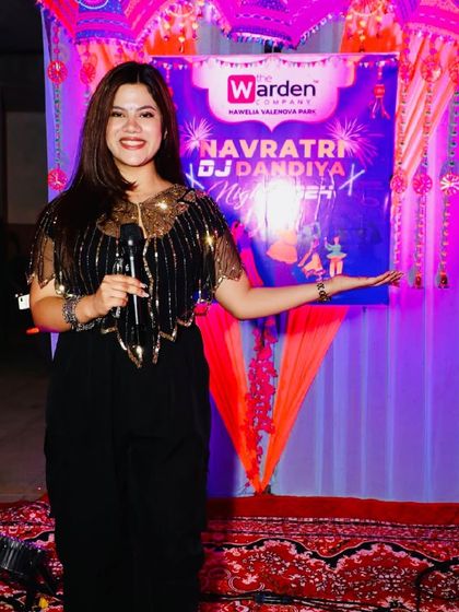 Welcoming guests to the Navratri DJ Dandiya Night. Ready to kick off an evening of dance and devotion.