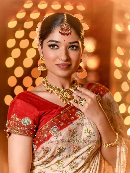 A beautiful portrait with a bokeh background, highlighting the flawless makeup.