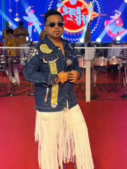 Full view of my Day 3 Navratri outfit, featuring a custom denim jacket and unique fringed pants. I love experimenting with fusion looks.