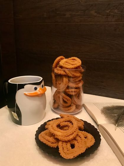 Our homemade Chakri, a spiral-shaped crunchy snack, is perfect for any time of the day. Enjoy these savory delights with your evening coffee or tea.