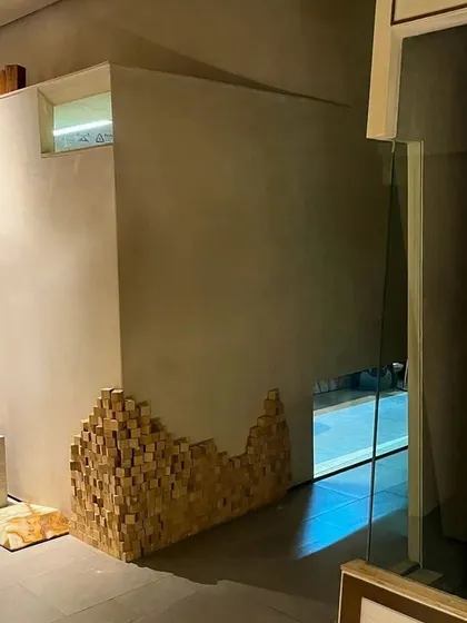 In my own office, I used details like this pixelated wooden block installation to tell a story. It links architecture with visual arts and showcases a consummate skill in detailing and material use.