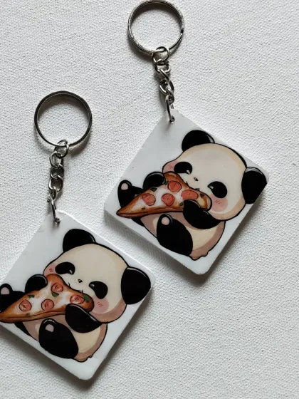 Who doesn't love a cute panda eating pizza? I hand-paint these custom keychains with any character or design you want. They make for a perfect small, personalized gift for a friend or your 'pookie'.