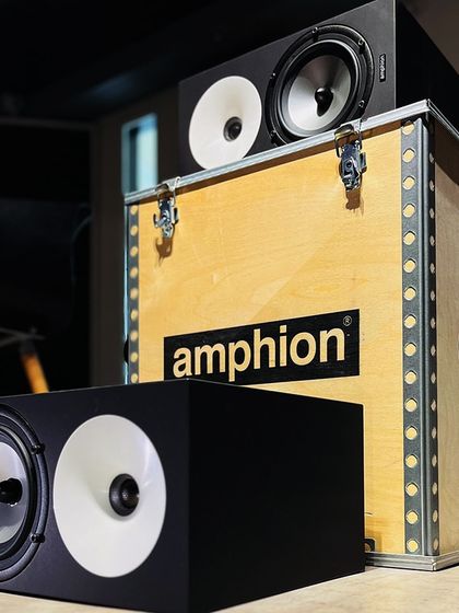 The Amphion One18 speakers, unboxed and ready to be installed. Their precise imaging is a game-changer for mixing and mastering sessions.