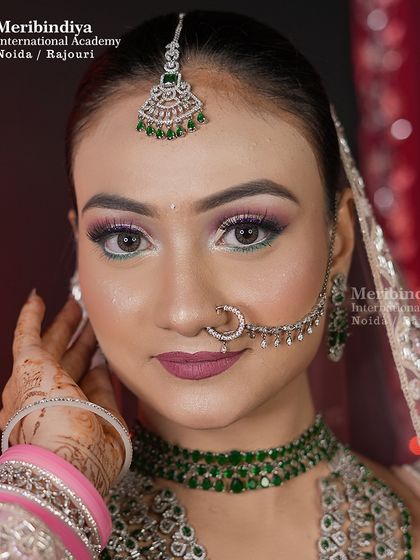 A direct and confident portrait that showcases the clean, sharp lines of the makeup, from the brows to the inner corner highlight.