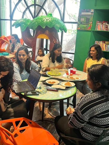 A heartwarming moment of connection between a mother and child during our "Mommy Moments" event, which combines playdates with insightful parenting talks.