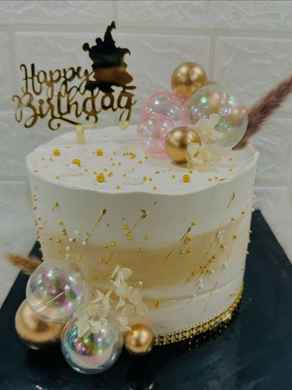 Another view of the enchanting bubble cake, showing how the light catches the iridescent spheres.