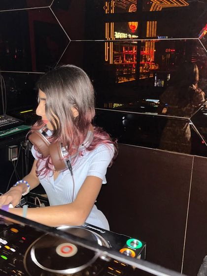 Another shot from my Sincity gig, showing me adjusting the levels on my Pioneer mixer.