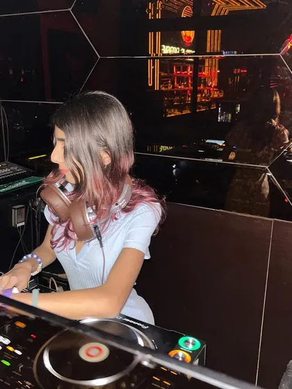 Another shot from my Sincity gig, showing me adjusting the levels on my Pioneer mixer.