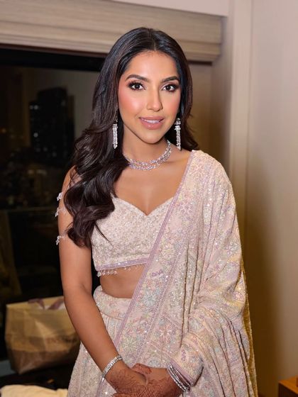 This image shows a complete soft glam look, perfect for a reception or engagement party. You'll learn to pair this makeup style with elegant hairstyles.