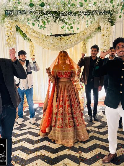 A beautiful moment as the bride makes her entrance under a Phoolon ki Chadar, held by her loved ones. I ensure even these traditional elements are beautifully decorated and ready for the ceremony.