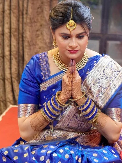 My gorgeous engagement bride Rohini. I created a glamorous yet classic look with a glowing base and defined eyes to match her royal blue saree.