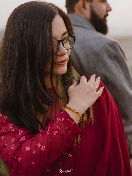A close-up shot focusing on the gentle touch and loving gaze, showcasing the deep bond they share.