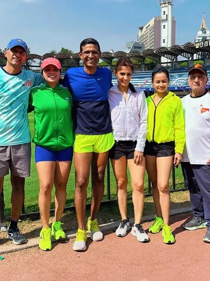 The team posing on the track after a successful competition. The smiles say it all. We train hard, race hard, and support each other every step of the way.