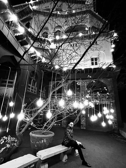 A quiet moment at the stunning Neemrana Fort before an Indo-Dutch wedding gig. The beautiful lighting at destination venues creates a magical atmosphere.