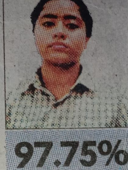 A newspaper clipping celebrating Shreya Khatnani for securing the 5th city rank with 97.75% in her 12th board exams. Our students consistently prove their mettle in academics.