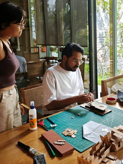 A moment of guidance and collaboration over a project model. We believe in a studio culture where ideas are shared and developed together through hands-on work.