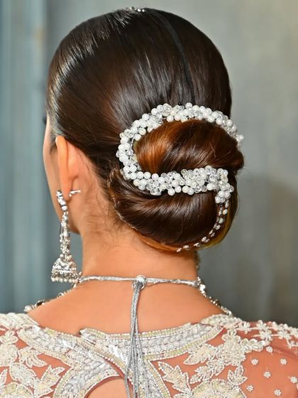 Elegant Bridal Buns & Updos photo 36