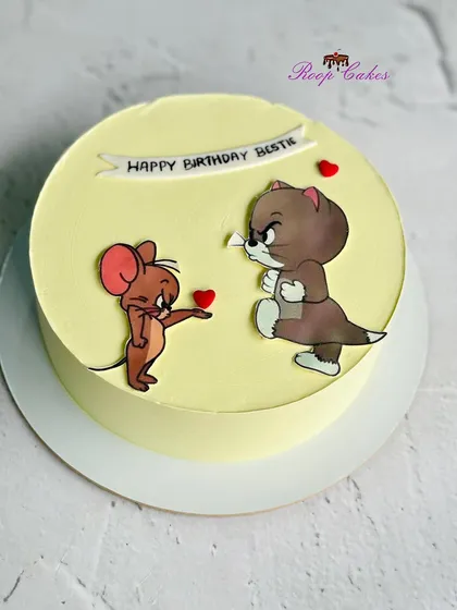 A fun half-kg cake featuring the classic duo, Tom and Jerry, perfect for a bestie's birthday.